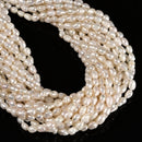 Grade A White Fresh Water Pearl Side Drill Nugget Beads 4-5x6-7mm 14" Strand