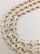 blue or white howlite turquoise cross beads
