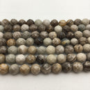 silver leaf jasper faceted round beads