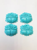 blue magnesite hand carved rose pendant