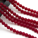 red dyed jade matte round beads
