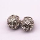 silver plated ball shape charm