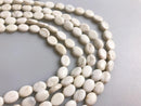 white turquoise flat oval beads