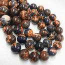 sunset sodalite smooth round beads 