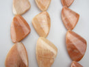 pink aventurine smooth twisted triangle shape beads
