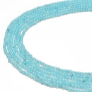 aqua blue dyed jade smooth round beads