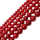 red bamboo coral smooth round beads