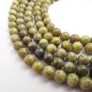 olive green sea sediment jasper smooth round beads