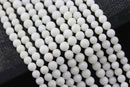 white bamboo coral smooth round beads