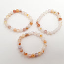 red dendritic montana agate bracelet smooth round