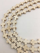 blue or white howlite turquoise cross beads