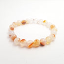 red dendritic montana agate bracelet smooth round