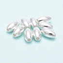 925 Sterling Silver Rice Shape Spacer Beads Size 4x7mm Sold 16 Pcs Per Bag
