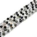 black tourmalinated quartz faceted round beads