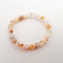 red dendritic montana agate bracelet smooth round