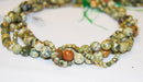 rainforest jasper rhyolite faceted round