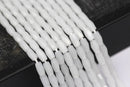 white opaque crystal glass faceted rice beads