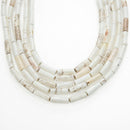 white turquoise round tube beads