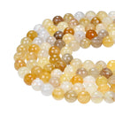 golden rutilated quartz faceted round beads