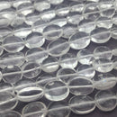 clear quartz smooth irregular flat oval beads