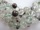 green rutilated quartz smooth round beads