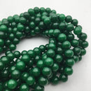 solid green dyed jade smooth round beads