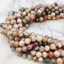 natural rhodochrosite faceted round beads