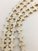 blue or white howlite turquoise cross beads