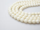 white bamboo coral smooth round beads