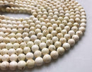 white turquoise smooth round beads