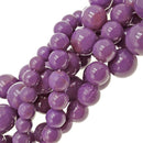 purple phosphosiderite smooth round beads 