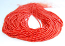 red orange bamboo coral smooth round beads