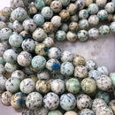 natural k smooth round beads