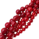 red bamboo coral smooth round beads 