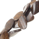 bronzite faceted twisted slice teardrop beads
