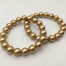 gold shell pearl bracelet smooth round