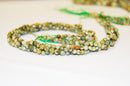 rainforest jasper rhyolite faceted round