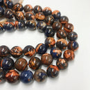 sunset sodalite smooth round beads