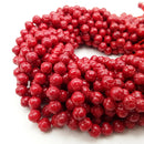 red bamboo coral carved round beads
