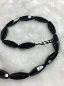 black onyx faceted rice shape beads