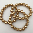 gold shell pearl bracelet smooth round