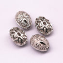 silver plated oval shape charm
