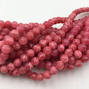 natural rhodochrosite smooth round