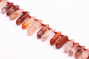 red amphibole quartz graduated top drill points beads