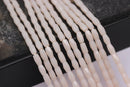 peach pink crystal glass faceted rice tube beads