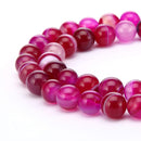 fuchsia Striped agate smooth round beads