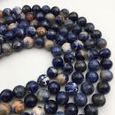 orange sodalite smooth round beads