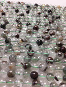 green rutilated quartz smooth round beads