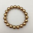 gold shell pearl bracelet smooth round