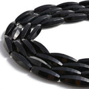 black onyx faceted rice shape beads